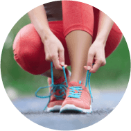 A person tying their laces