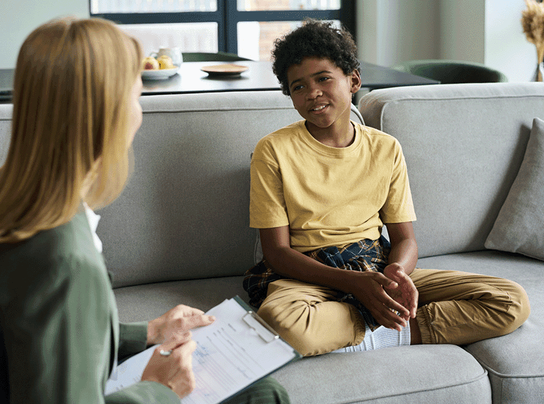 Support worker with young person