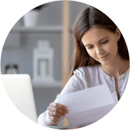 Woman reading from a sheet of paper
